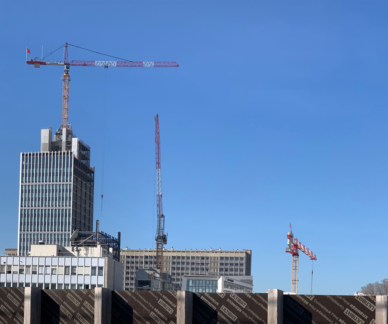 Tower crane on a concrete high-rise